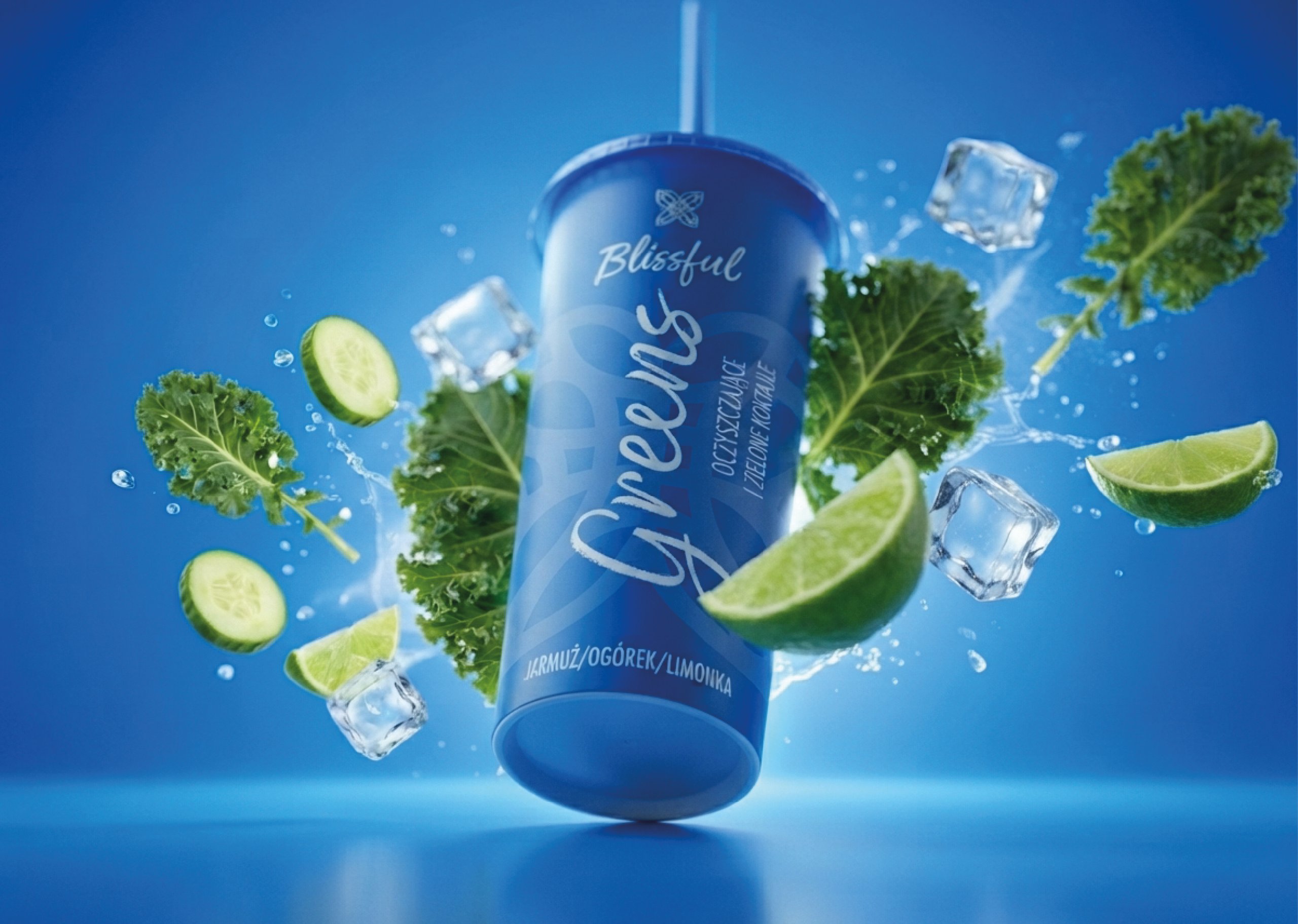 Blue “Blissful” beverage bottle surrounded by kale, cucumber, lime, ice, and splashing water.